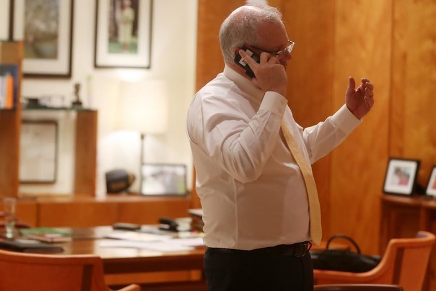 Scott Morrison receives a phone call from the Queen.