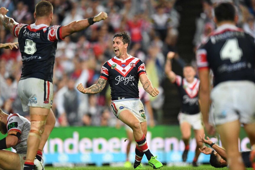 The Roosters' Mitchell Pearce celebrates a match-winning field goal to beat St George Illawarra.