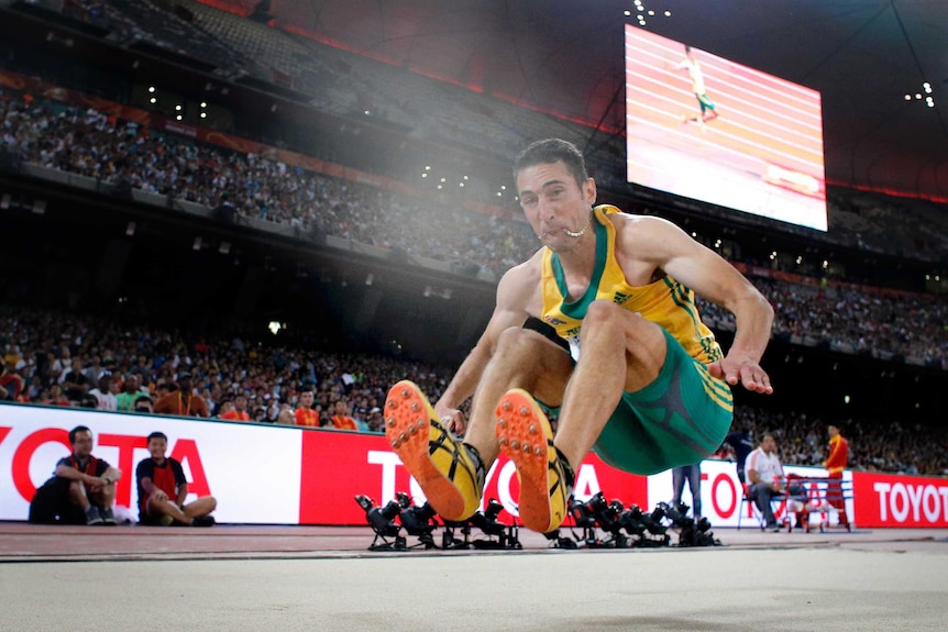 Fabrice Lapierre competing in the long jump at the world athletics championships in Beijing