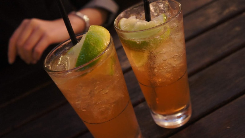 Two glasses of lemon lime and bitters with ice