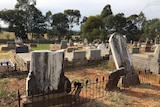 Damaged headstones at Molong cemetery