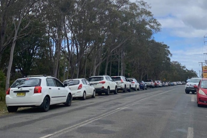 A queue of cars in a regional town.