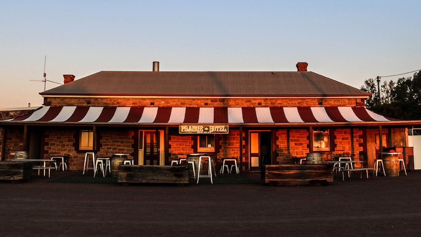 Sunset falls across the Prairie Hotel at Parachilna