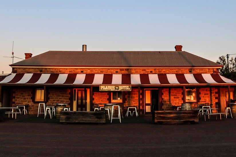 Sunset falls across the Prairie Hotel at Parachilna