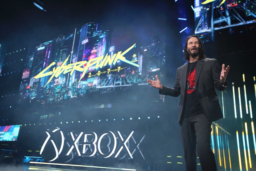 Keanu Reeves speaks onstage at E3.