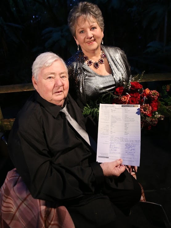 Lee Bransden and Sandra Yates with their wedding certificate in New Zealand.
