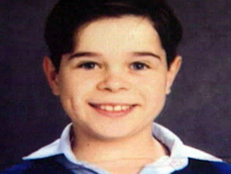 Gerard Ross smiles in what appears to be a school photo.