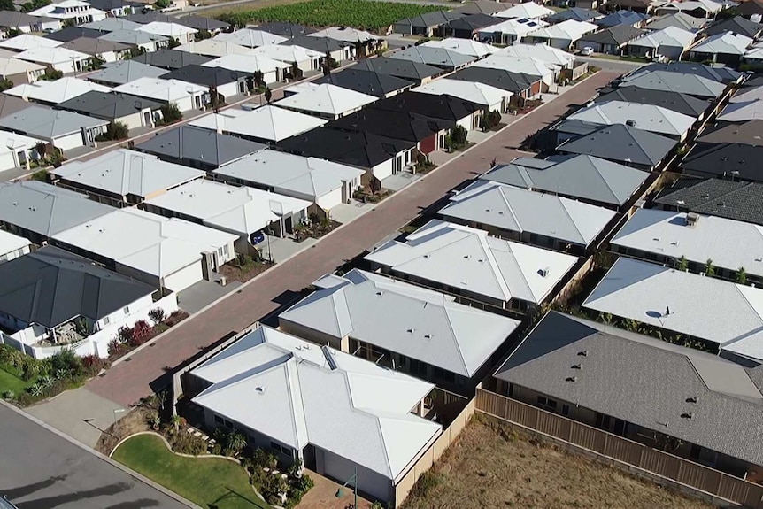 A aerial shot of a closely packed housing development.