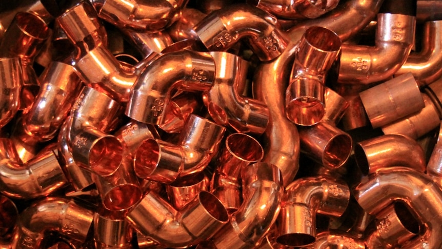 Lots and lots of shiny copper pipe fittings