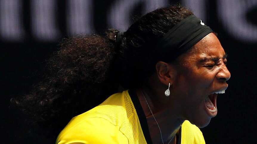 Serena Williams reacts to winning a point on her way to a quarter-final victory over Maria Sharapova.