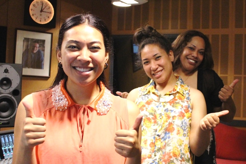 Tongan gospel singers in the studio control room