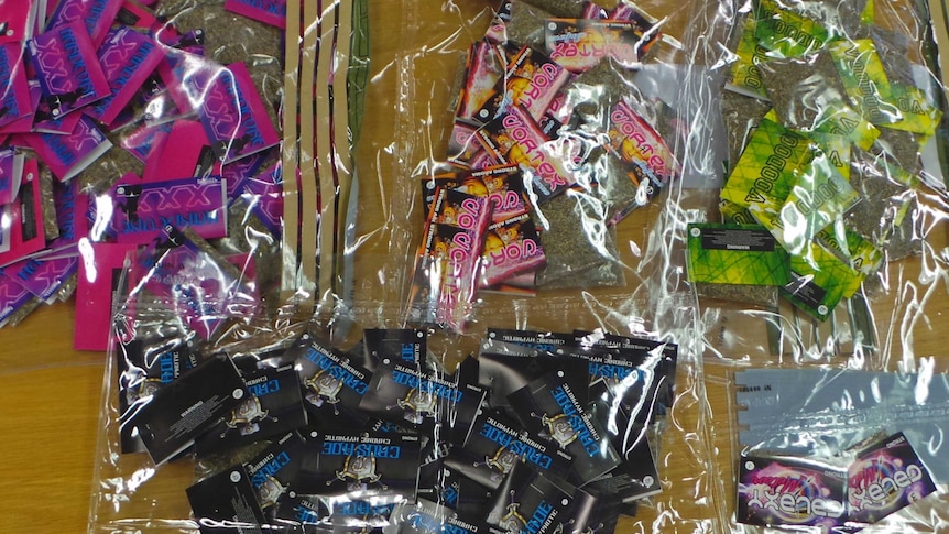 Packets of synthetic drugs seized by police during raids in Canberra in May 2014.