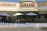 Police tape outside fruit shop in Villawood