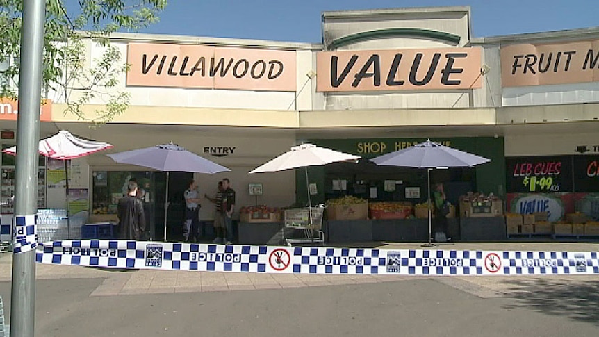 Police tape outside fruit shop in Villawood