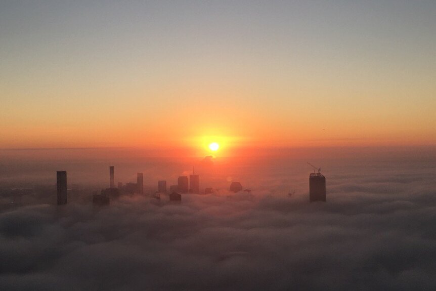 A helicopter view of Brisbane this morning captured the fog, the second heavy fog in a week.