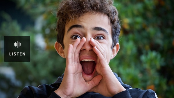 Young child yelling with mouth open. Has Audio.