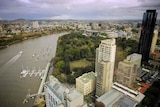 High-rise photo of City Botanic Gardens, Kangaroo Point cliffs, city buildings and river in Brisbane.