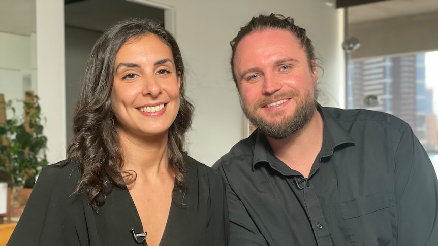 Melbourne couple Rosella Sciurti and Daniel Fischer smiling in their home.