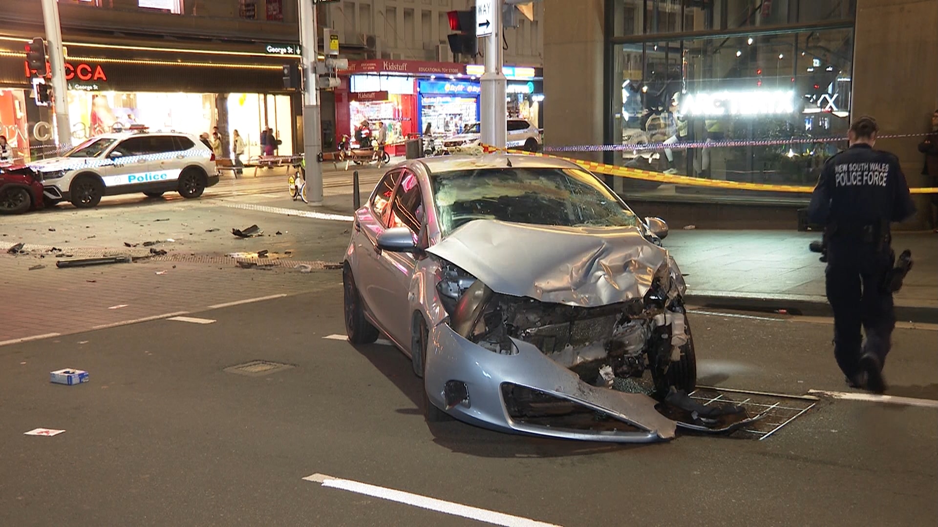 Pedestrian, police car struck after Sydney CBD carjacking
