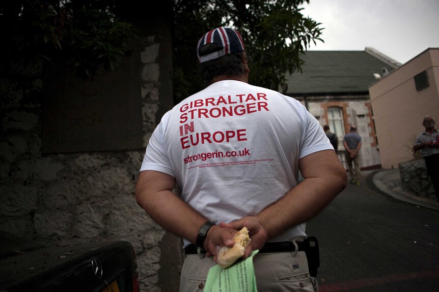 A man wears a t-shirt saying Gibraltar stronger in Europe.