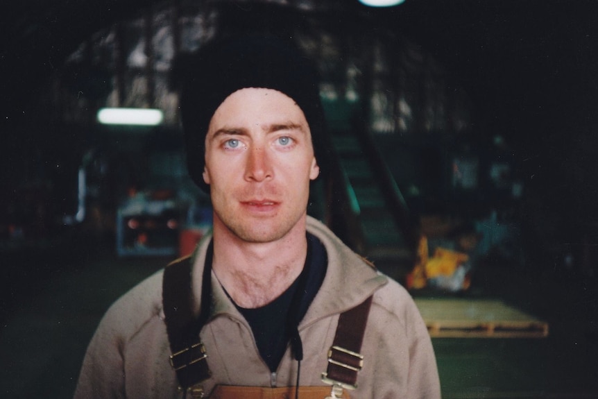 Nick Johnson at work in the McMurdo waste management team.