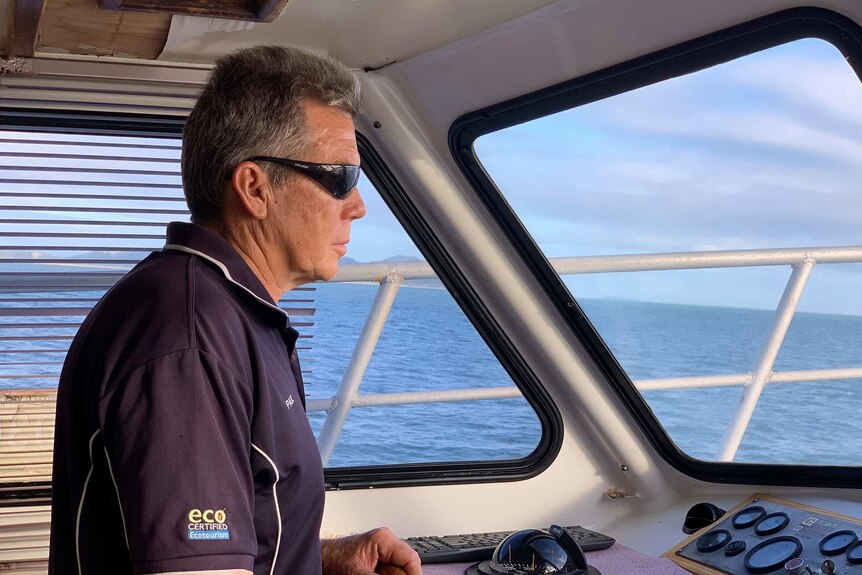 Townsville tourism operator Paul Crocombe on his reef tour boat.