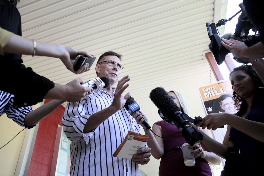 Country Liberals Leader Terry Mills talks to the media at Moulden Park Primary School in Palmerston.