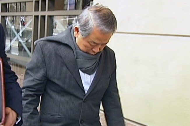 Albert Ooi leaves the Magistrates Court.
