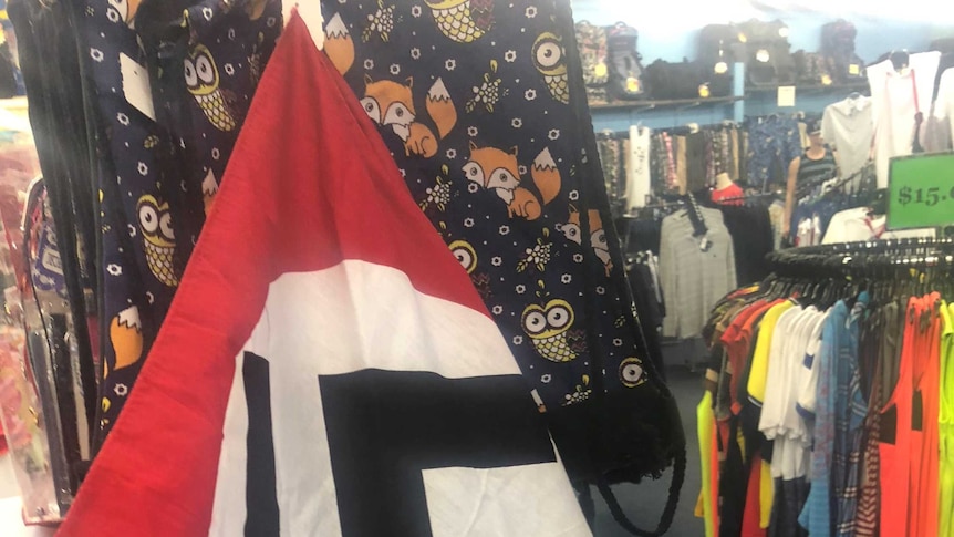 One of six bandanas emblazoned with the Nazi emblem were 'mistakenly' for sale at a clothing store in Kununurra.