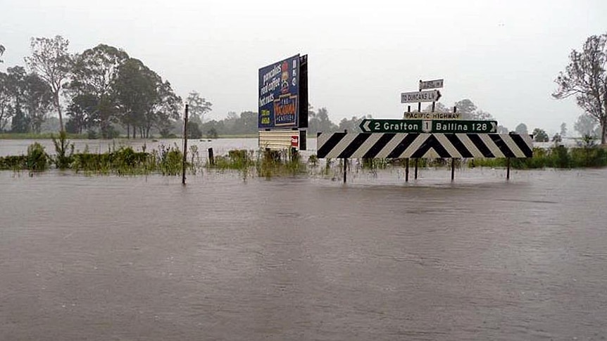 Floodwaters cover the Pacific Highway just north of Grafton.