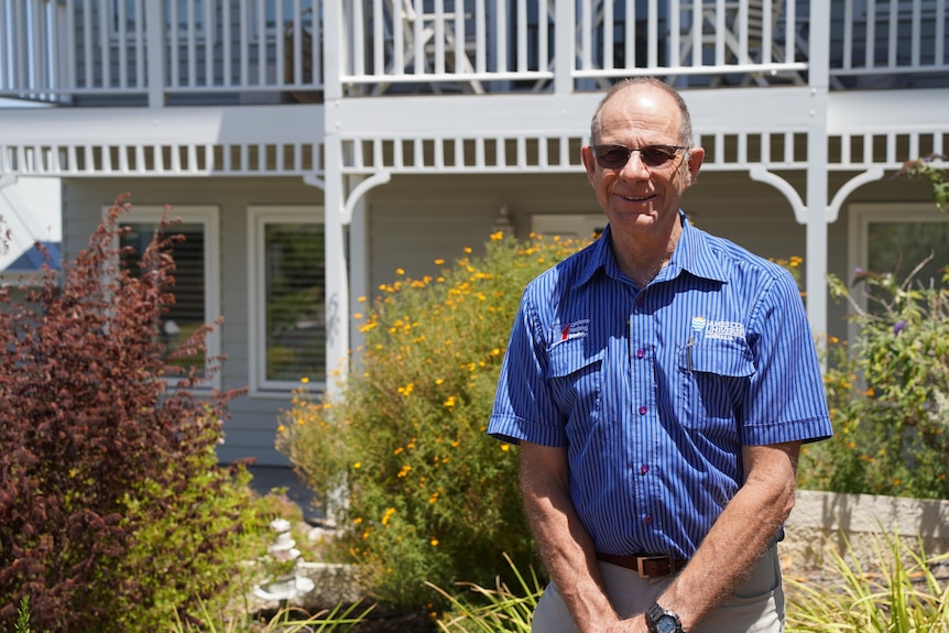 Geoff Boughton outside is home