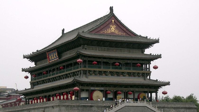 The assailant committed suicide by jumping off the second story of the Drum Tower.
