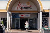 A woman wearing a mask shopping during the COVID-19 outbreak lockdown of Katherine.