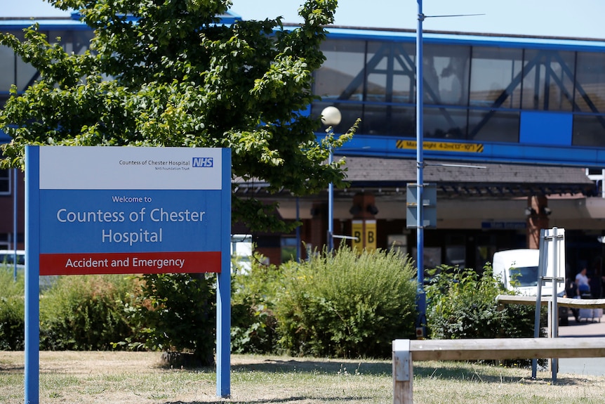 A sign outside a building reads COUNTESS OF CHESTER HOSPITAL ACCIDENT AND EMERGENCY