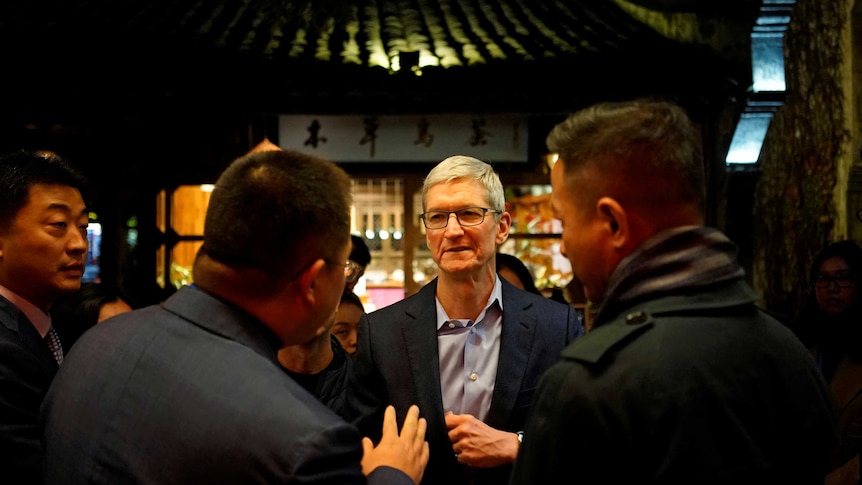 Apple CEO Tim Cook arrives before the fourth World Internet Conference.