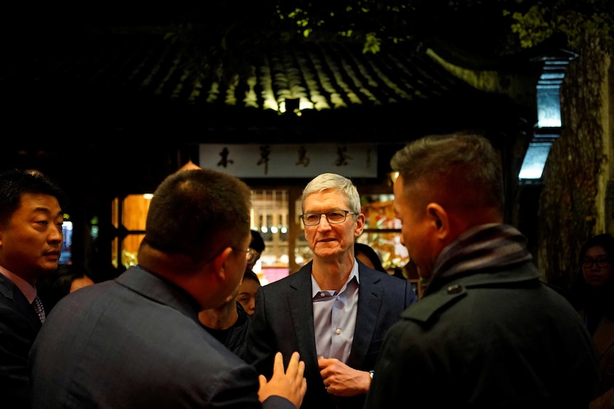 Apple CEO Tim Cook arrives before the fourth World Internet Conference.