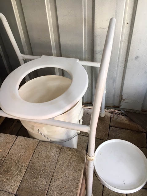 Makeshift composting toilet