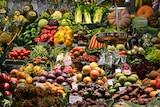 A lush, colourful display of fresh fruit and vegetables at a grocer