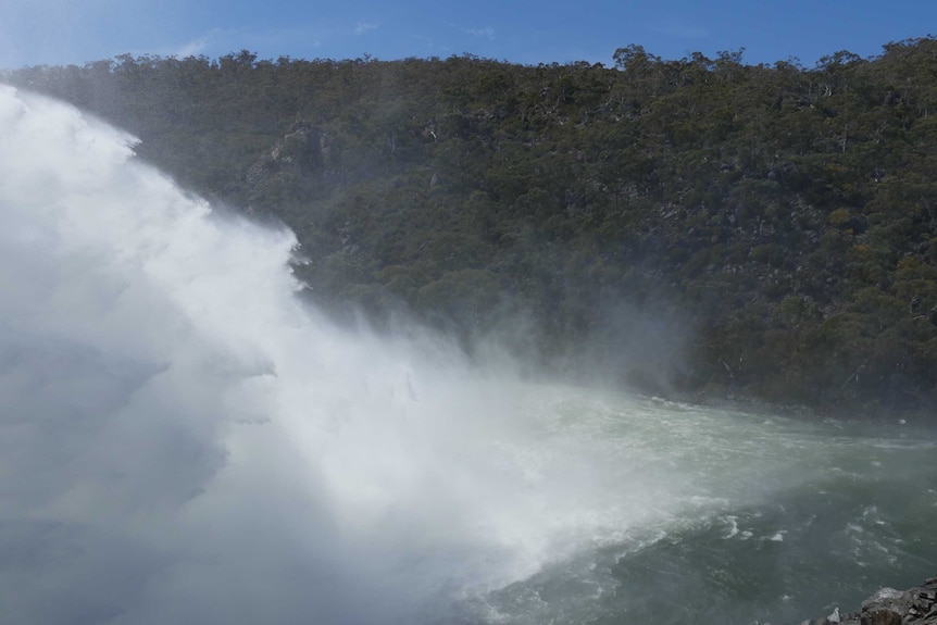 Water from Snowy River blows in wind