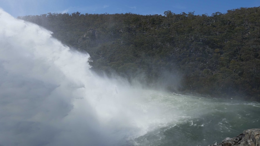 Water from Snowy River blows in wind