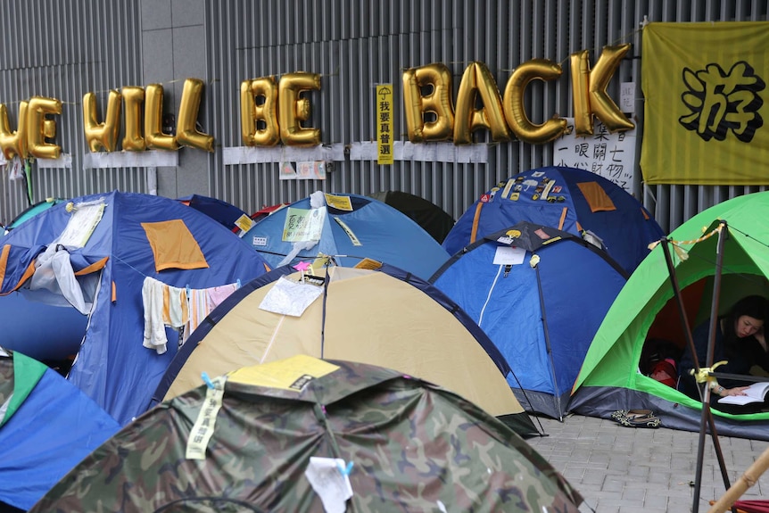 Pro-democracy protesters prepare for Hong Kong authorities to clear the protest camps