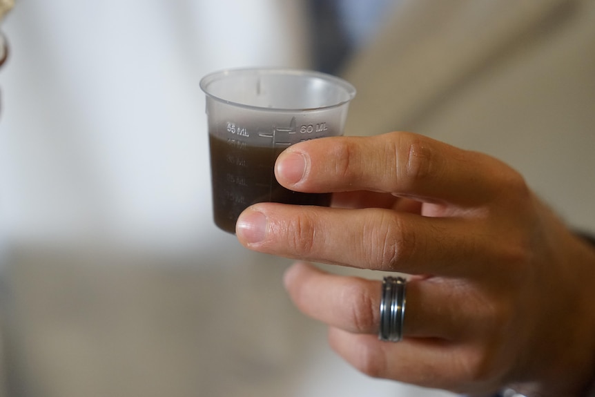 Photo of a cup of dark liquid