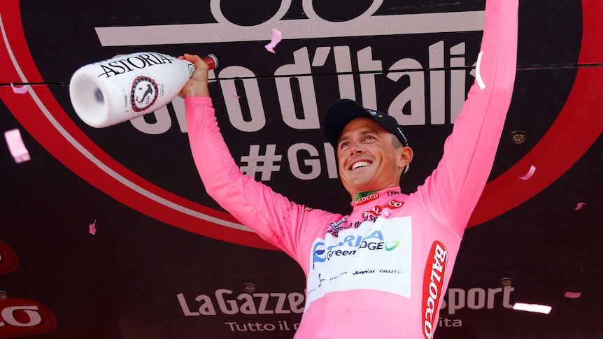 Simon Gerrans celebrates with the Giro pink jersey