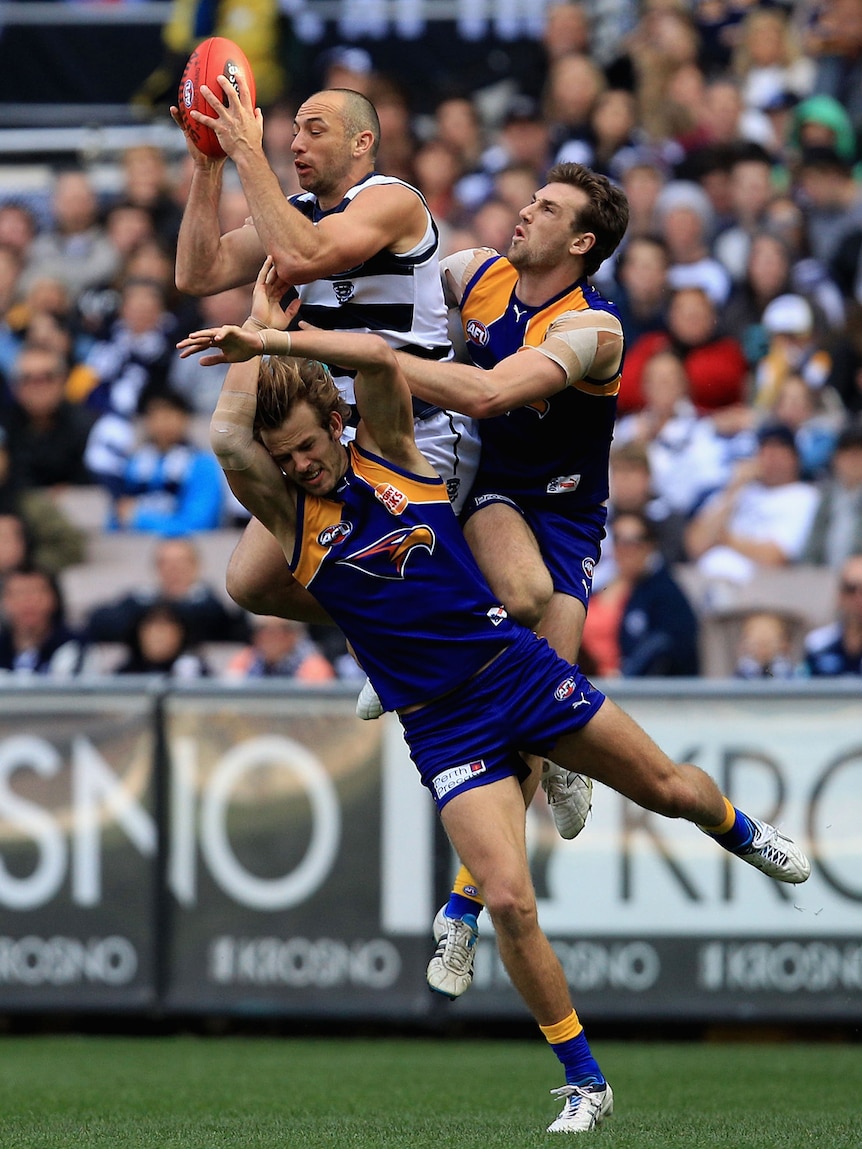 James Podsiadly marks strongly on the way to the Cats belting win in the preliminary final over West Coast.