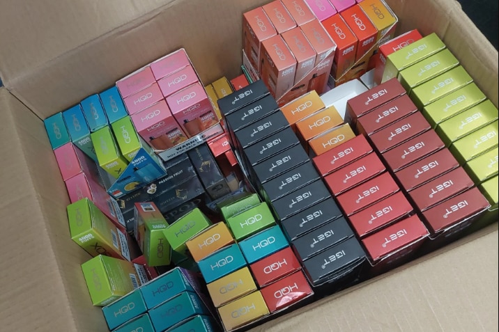 A box containing lots of colourful packages