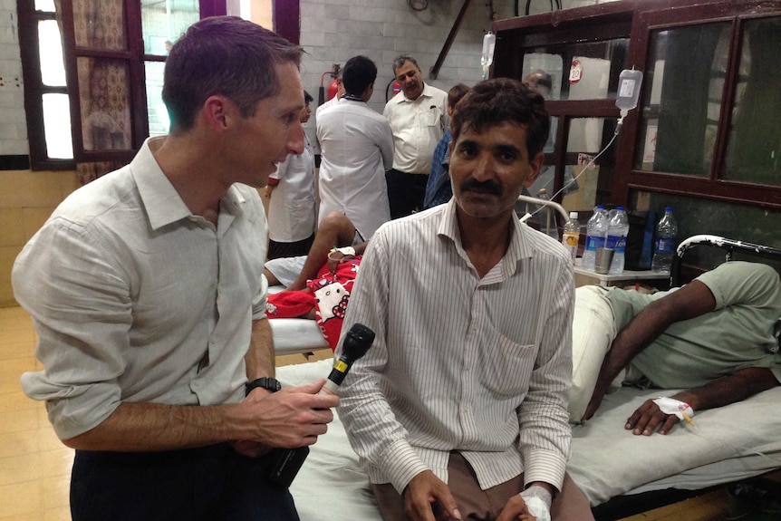 A dengue fever patient in a ward in New Delhi, India