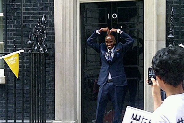 Britain's Mo Farah does the 'Mobot' outside 10 Downing Street.