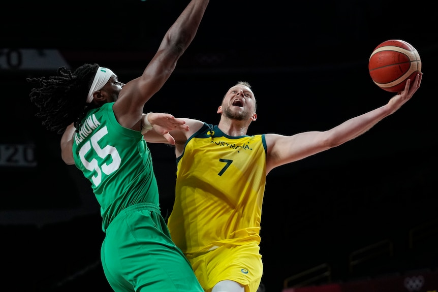 Australia's Joe Ingles drives to the basket against Nigeria's Precious Achiuwa during the Tokyo Olympics.