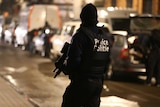 Police officers take part in an operation in Brussels.