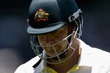 Shane Watson of Australia leaves the field after being dismissed by Stuart Broad